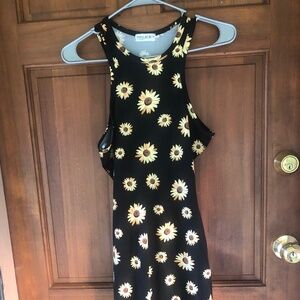 Sleeveless mini dress with a high/halter-style neckline.